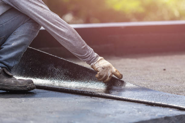 Professional Basement Waterproofing technician working in Rosalia, KS